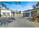 Wide driveway leading to a home with a three-car garage and a beautiful exterior at 7436 Oak Grove Ave, Las Vegas, NV 89117