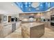 Spacious kitchen with custom cabinetry, stainless steel appliances, and large island at 7436 Oak Grove Ave, Las Vegas, NV 89117