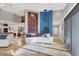 Open living space showcasing hardwood floors, designer decor and a spacious layout at 7436 Oak Grove Ave, Las Vegas, NV 89117