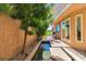 Serene backyard patio featuring a water feature and access to the golf course at 7711 Spanish Lake Dr, Las Vegas, NV 89113