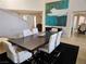 Spacious dining room with stylish decor, modern furniture, and plenty of natural light at 7711 Spanish Lake Dr, Las Vegas, NV 89113
