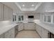 Bright kitchen with stainless steel appliances, custom cabinets and countertop space at 7711 Spanish Lake Dr, Las Vegas, NV 89113