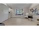 Well-lit home office with custom built-ins, a window seat and sleek desk at 7711 Spanish Lake Dr, Las Vegas, NV 89113