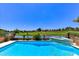 Sparkling pool with clear blue water offers great views of the community golf course at 7711 Spanish Lake Dr, Las Vegas, NV 89113