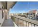 Balcony view of quiet street, with well-maintained houses, and plenty of parking at 7745 Tyrell Peaks St, Las Vegas, NV 89139