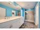 Bathroom with a large shower, double vanity, and elegant finishes at 7745 Tyrell Peaks St, Las Vegas, NV 89139