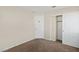 Bedroom with carpet, a standard closet and a door to the main house at 8005 Dover Shores Ave, Las Vegas, NV 89128