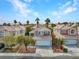 Charming two-story home featuring a two-car garage, desert landscaping, and a well-maintained front yard at 8005 Dover Shores Ave, Las Vegas, NV 89128