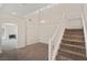 Living room with staircase leading up to a cozy living area at 8005 Dover Shores Ave, Las Vegas, NV 89128