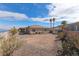Expansive backyard with desert landscape and views of Lake Mohave in a scenic setting at 809 Lake Hill Dr, Boulder City, NV 89005