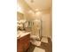 A well-lit bathroom showcasing a vanity with towels and a walk-in shower at 809 Lake Hill Dr, Boulder City, NV 89005