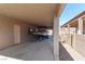 Convenient covered boat parking area connected to the covered patio and adjacent to the pool at 809 Lake Hill Dr, Boulder City, NV 89005