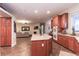 The kitchen features an island, a double oven, and an open concept leading to the living area at 809 Lake Hill Dr, Boulder City, NV 89005