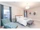 The main bedroom features a chandelier, decor and an outdoor view through large windows at 809 Lake Hill Dr, Boulder City, NV 89005