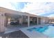 Covered patio area with a pool and jacuzzi, offering a relaxing outdoor living space at 809 Lake Hill Dr, Boulder City, NV 89005