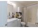 Bright bathroom with a hexagon backsplash, modern vanity, and a shower-tub combination at 8198 Palmada Dr, Las Vegas, NV 89123