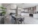 Modern dining area open to kitchen featuring a large table and stylish decor at 8198 Palmada Dr, Las Vegas, NV 89123