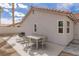 Outdoor patio featuring a dining set, providing a comfortable space for enjoying meals and gatherings al fresco at 8198 Palmada Dr, Las Vegas, NV 89123