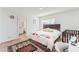 Cozy bedroom boasts a queen bed, modern decor, and attached bathroom at 8729 Country View Ave, Las Vegas, NV 89129