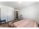 Simple bedroom featuring white walls, closet and standard sized bed at 8729 Country View Ave, Las Vegas, NV 89129