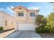 Beautiful two-story home featuring a well-maintained exterior, two-car garage, and landscaped front yard at 8729 Country View Ave, Las Vegas, NV 89129