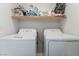 Laundry room equipped with modern washer and dryer units at 8729 Country View Ave, Las Vegas, NV 89129