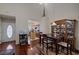 View of the open dining area showing soaring ceilings and adjacent kitchen at 8970 Tom Noon Ave, Las Vegas, NV 89178