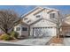 Charming two-story house boasts a two-car garage at 8970 Tom Noon Ave, Las Vegas, NV 89178