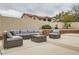 Outdoor patio with fire pit and comfortable seating offering a relaxing retreat at 9611 Trattoria St, Las Vegas, NV 89178