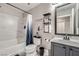 Stylish bathroom with a shower-tub, a toilet, a sink, and modern fixtures at 9611 Trattoria St, Las Vegas, NV 89178