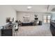 Versatile bonus room with a built-in desk, computer and natural light at 9611 Trattoria St, Las Vegas, NV 89178
