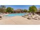 Sparkling community pool with ample lounge chairs and shaded seating areas for residents to enjoy at 9611 Trattoria St, Las Vegas, NV 89178