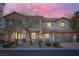 Charming two-story home with well-maintained landscaping and an attached two-car garage at 9611 Trattoria St, Las Vegas, NV 89178