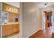 Bathroom with double vanity, wood flooring, and warm lighting fixtures at 9992 Oyster Pearl St, Las Vegas, NV 89183