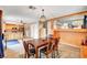 Inviting dining area featuring a wooden table with seating for four and contemporary decor at 9992 Oyster Pearl St, Las Vegas, NV 89183