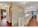 Open hallway with hardwood floors and secondary bedrooms at 9992 Oyster Pearl St, Las Vegas, NV 89183