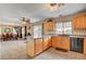 Kitchen and dining area, offering an open layout and modern appliances, all lit by natural light at 9992 Oyster Pearl St, Las Vegas, NV 89183