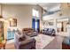 Bright and airy living room showcasing modern decor, ample seating, and hardwood floors at 9992 Oyster Pearl St, Las Vegas, NV 89183