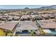 Community aerial view featuring single Gathering homes, desert landscape and city view at 10062 Mountain Foothills Ave, Las Vegas, NV 89149