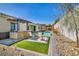 Outdoor bar and lounge area with seating near the pool, perfect for summer entertaining at 10062 Mountain Foothills Ave, Las Vegas, NV 89149
