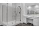 Modern bathroom with a glass-enclosed shower, vanity area, and contemporary fixtures at 10062 Mountain Foothills Ave, Las Vegas, NV 89149