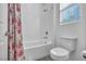 This bright, clean bathroom features a tiled shower and tub at 10062 Mountain Foothills Ave, Las Vegas, NV 89149