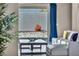 View from the living room showcasing the pool and backyard, and a stylish interior at 10062 Mountain Foothills Ave, Las Vegas, NV 89149