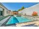 Sparkling backyard pool and spa provides an inviting oasis for relaxation and recreation at 10062 Mountain Foothills Ave, Las Vegas, NV 89149