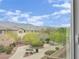 Picturesque view of the surrounding community and mountains from a window at 10368 Pima Crossing Ave, Las Vegas, NV 89166