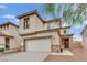 Charming two-story home with a two car garage and well maintained landscaping at 10368 Pima Crossing Ave, Las Vegas, NV 89166