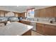 Well-appointed kitchen featuring stainless steel appliances, ample counter space and a convenient kitchen island at 10368 Pima Crossing Ave, Las Vegas, NV 89166