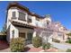 Charming two-story home featuring a manicured front yard and a two-car garage at 10783 Vestone St, Las Vegas, NV 89141