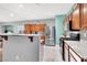 Modern kitchen with granite counters, stainless appliances, and an eat-in bar at 10783 Vestone St, Las Vegas, NV 89141
