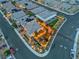 Nice aerial view of homes with solar panels, landscaped yards, and a cozy backyard patio area at dusk at 10988 Wonder Hills St, Las Vegas, NV 89141